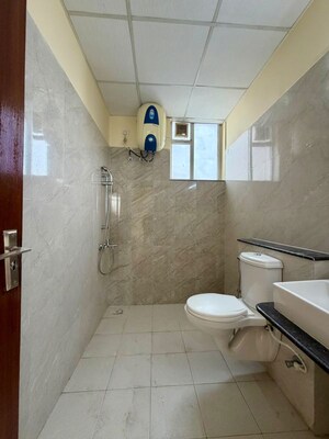 Bathroom in 3 BHK Apartment at Sushma Crescent, Dhakoli – for Rent