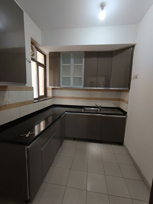 Kitchen in 2 BHK Apartment at Unitech Uniworld Gardens 2, Sector 47 – for Rent