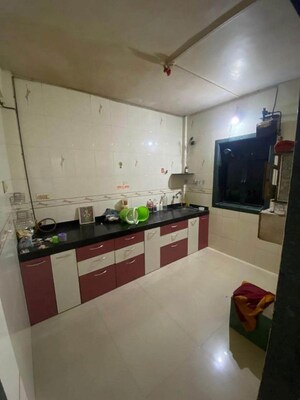 Kitchen in 2.5 BHK Apartment at Adarsh Nagar CHS Uthalsar, Uthalsar – for Rent