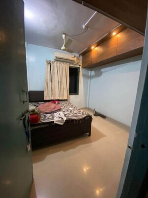Bedroom in 2.5 BHK Apartment at Adarsh Nagar CHS Uthalsar, Uthalsar – for Rent