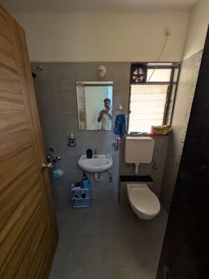 Bathroom in 2 BHK Apartment at KM Horizon Exotica, Haware City – for Rent