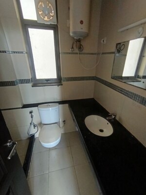Bathroom in 2 BHK Apartment at Unitech Uniworld Gardens 2, Sector 47 – for Rent