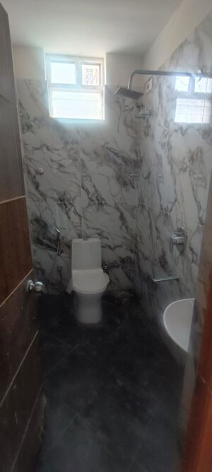 Bathroom in 3 BHK Apartment at Amrutahalli – for Rent