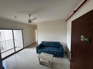 Living Room in 2 BHK Apartment at Mahindra Happinest Tathawade Phase 1, Tathawade – for Rent