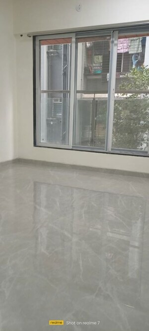 Bedroom in 2 BHK Apartment at Meghna Riviera, Goregaon West – for Sale