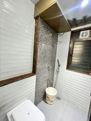 Kitchen in 3 BHK Apartment at Raheja Tipco Heights, Malad East – for Rent