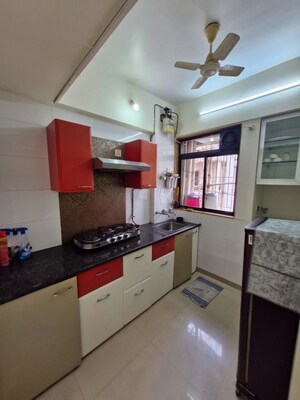 Kitchen in 1.5 BHK Apartment at Puranik Hometown, Ghodbunder Road – for Rent