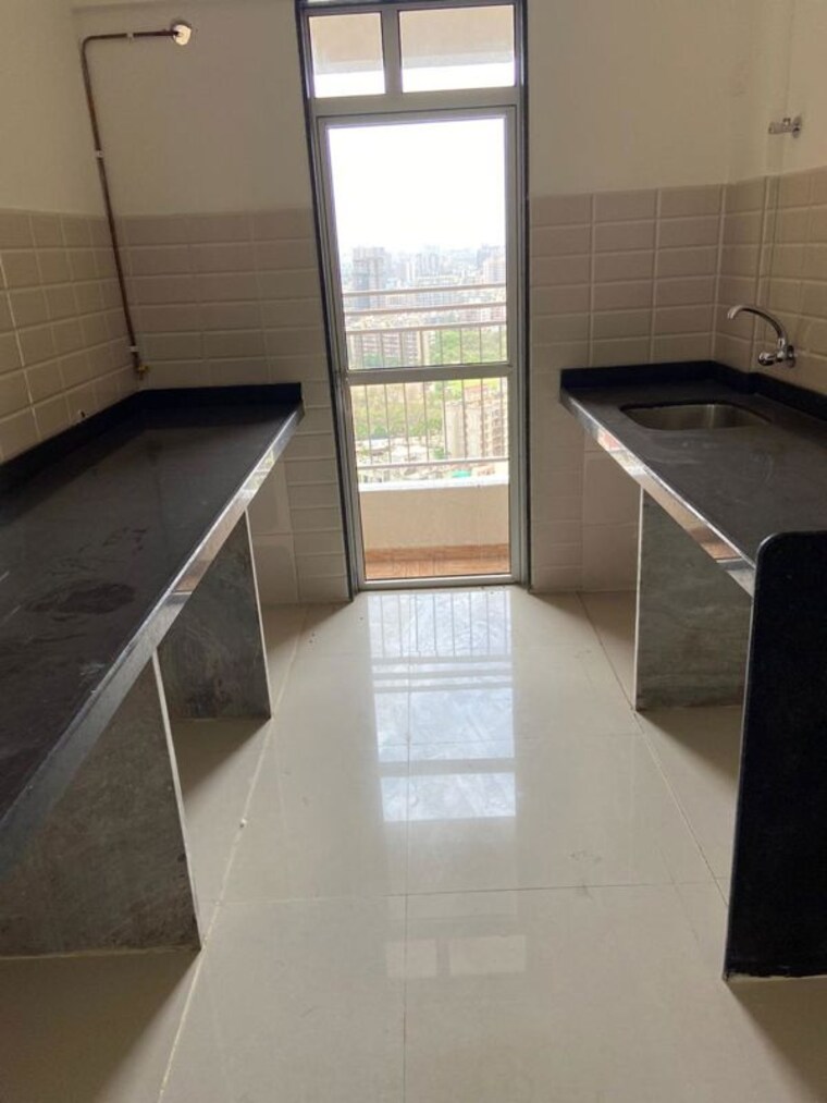 Kitchen, jp-north-barcelona 2 Bedroom 650 Sq.Ft. Apartment In Mira Road Thane 10630274