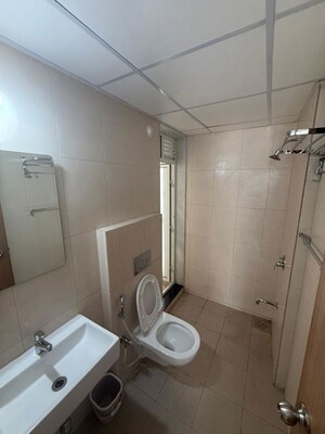 Bathroom in 3 BHK Apartment at Godrej Emerald, Ghodbunder Road – for Rent