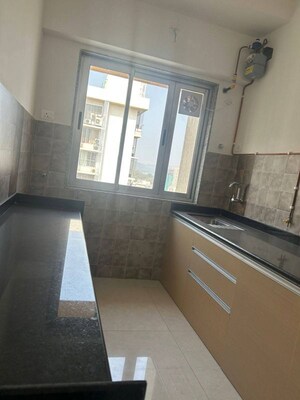Kitchen in 1 BHK Apartment at Sangam Veda, Andheri East – for Sale