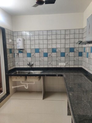 Kitchen in 3 BHK Apartment at Paradise Lifespaces Sai World City, New Panvel – for Rent