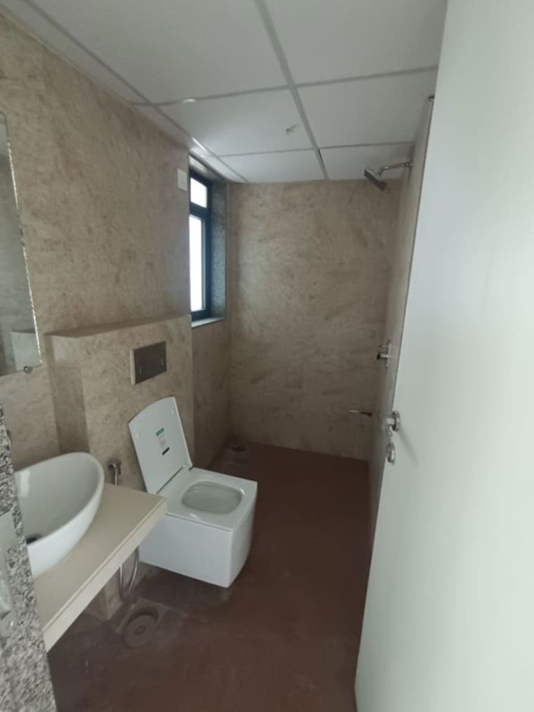 Bathroom, paradise-lifespaces-sai-world-city 2 Bedroom 682 Sq.Ft. Apartment In New Panvel Navi Mumbai 10630300