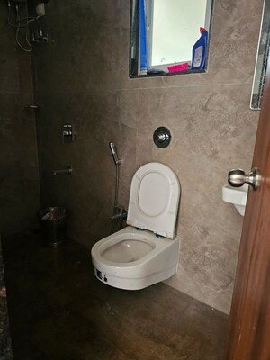 Bathroom in 2 BHK Apartment at Paradise Lifespaces Sai World City, New Panvel – for Rent