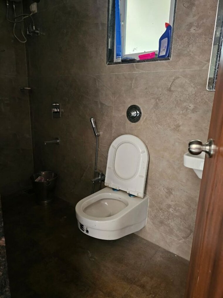 Bathroom, paradise-lifespaces-sai-world-city 2 Bedroom 682 Sq.Ft. Apartment In New Panvel Navi Mumbai 10630300