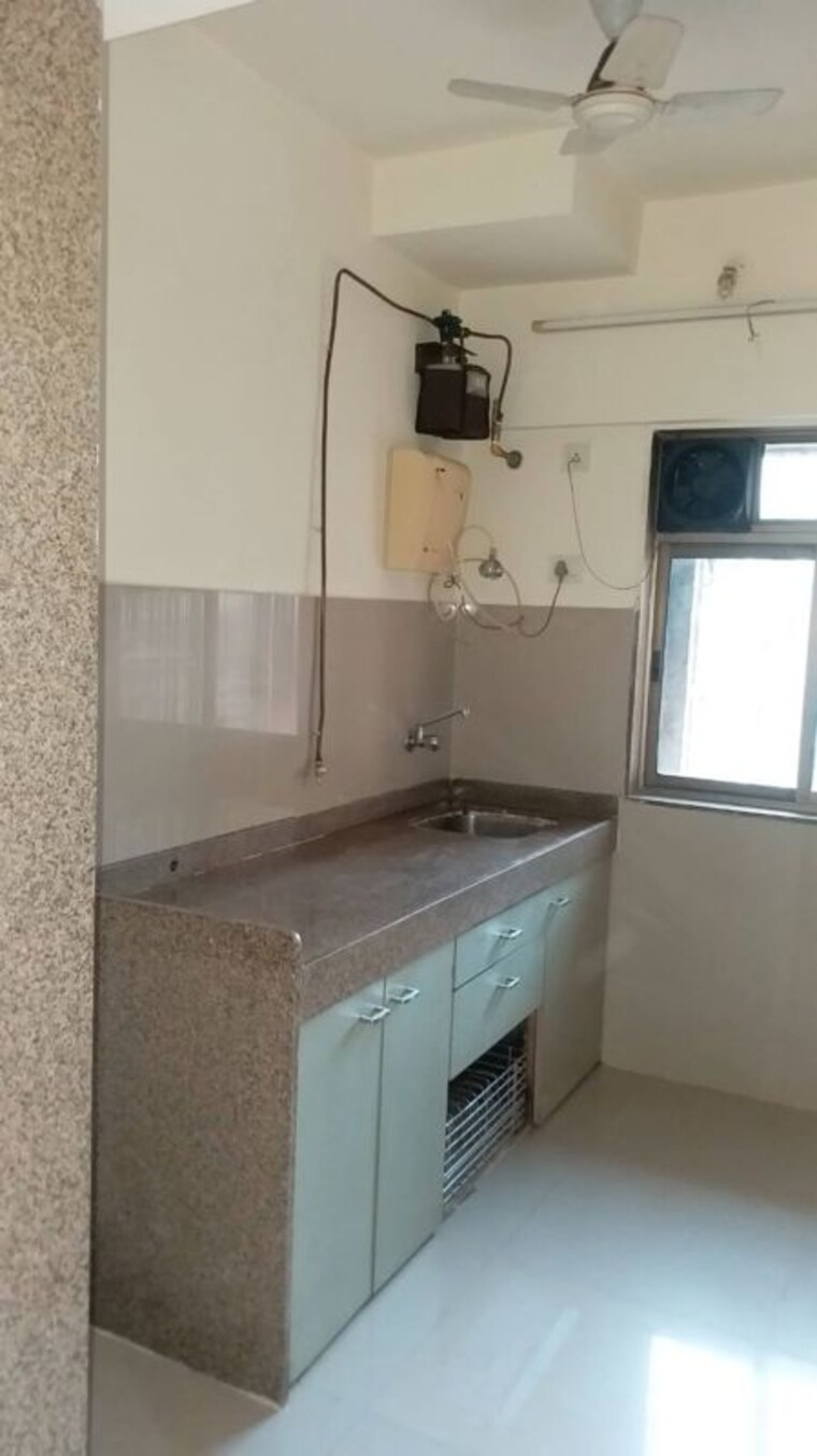 Kitchen, purshottam-nayan 1 Bedroom 450 Sq.Ft. Apartment In Ghodbunder Road Thane 10630321