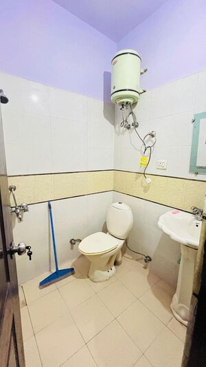 Bathroom in 1 BHK Apartment at Nilaya Greens, Raj Nagar Extension – for Rent