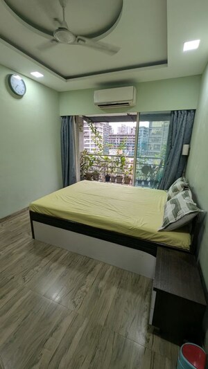 Bedroom in 2 BHK Apartment at NRI Complex Phase I, Seawoods Sector 58 – for Rent