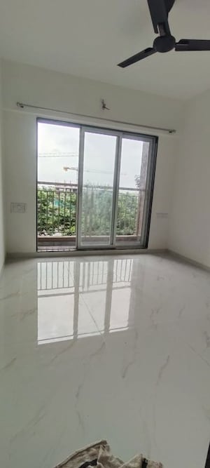 Bedroom in 2 BHK Apartment at Anant Metropolis Insignia Towers, Kasarvadavali – for Rent