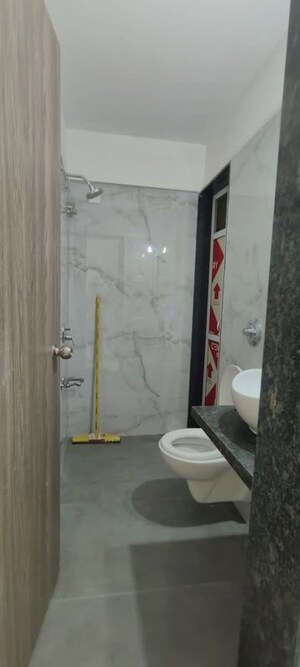 Bathroom in 2 BHK Apartment at Anant Metropolis Insignia Towers, Kasarvadavali – for Rent