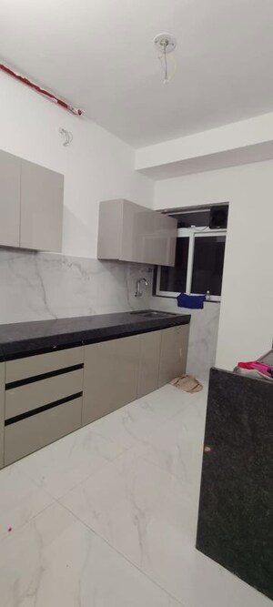 Kitchen in 2 BHK Apartment at Anant Metropolis Insignia Towers, Kasarvadavali – for Rent