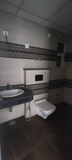 Bathroom in 4 BHK Apartment at Pareena Express Heights, Sector 99 – for Rent