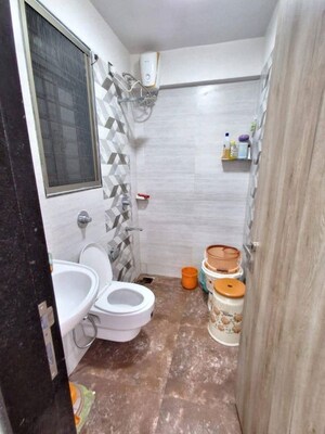 Bathroom in 2 BHK Apartment at Manik Moti Varsova, Versova – for Rent
