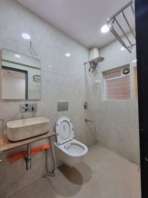 Bathroom in 2 BHK Apartment at Varun Garden, Ghodbunder Road – for Rent