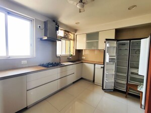 Kitchen in 4 BHK Apartment at Hiranandani Brookhill, Ghodbunder Road – for Rent