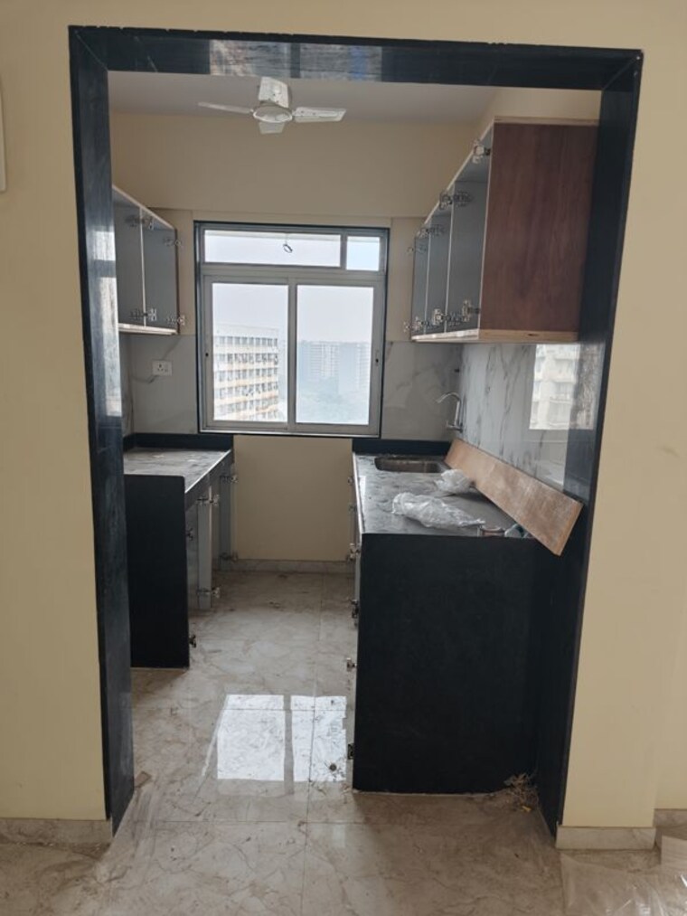 Kitchen, rohinton-guruprasad-divine-residency 1 Bedroom 430 Sq.Ft. Apartment In Chembur Mumbai 10630549
