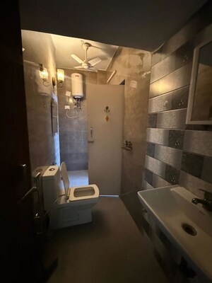 Bathroom in 2 BHK Builder Floor at Kalkaji – for Rent