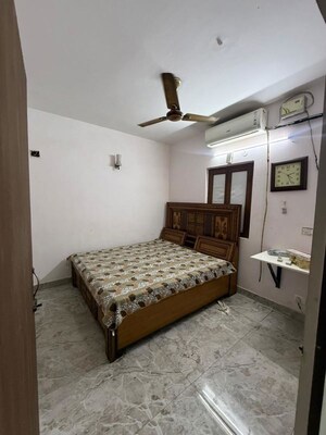 Bedroom in 2 BHK Builder Floor at Kalkaji – for Rent