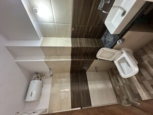 Bathroom in 1 BHK Apartment at Harshail Falcon, Malad West – for Rent