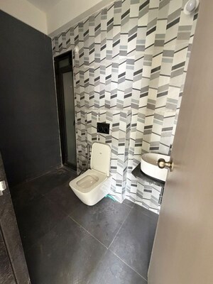 Bathroom in 2 BHK Apartment at Dhamji Shamji Mahavir Spring Tulip Phase 1, Pokhran Road No Two – for Rent