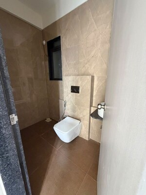 Bathroom in 2 BHK Apartment at Dhamji Shamji Mahavir Spring Tulip Phase 1, Pokhran Road No Two – for Rent