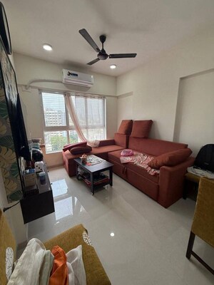 Living Room in 2 BHK Apartment at Romell Amore, Andheri West – for Rent