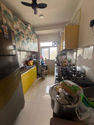 Kitchen in 2 BHK Apartment at Romell Amore, Andheri West – for Rent