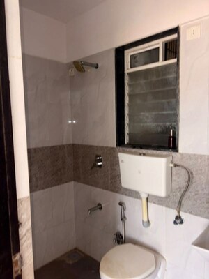 Bathroom in 3 BHK Apartment at Shree Samarth Aura, Bhandup West – for Rent