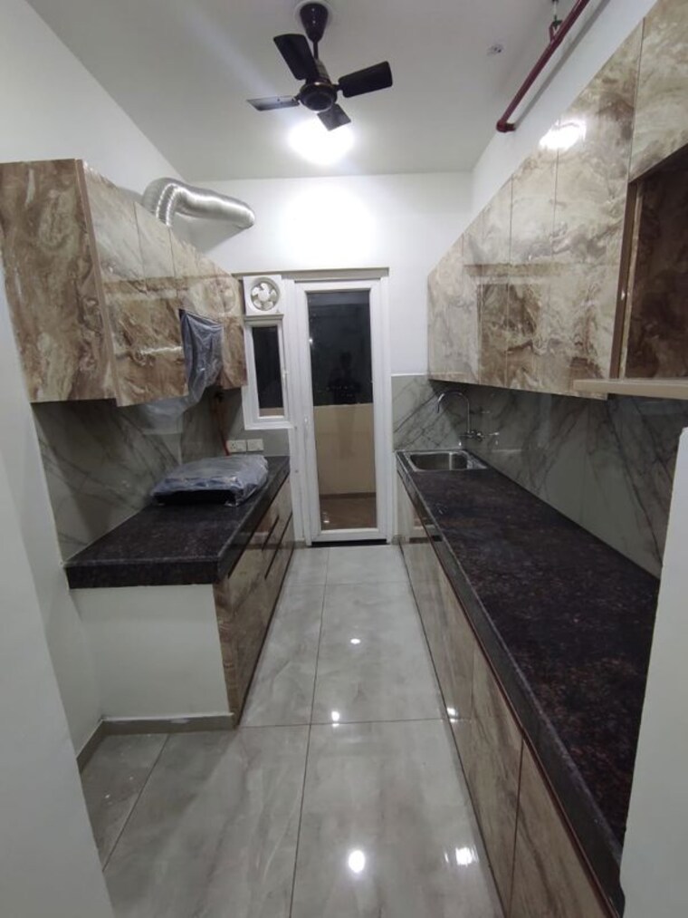 Kitchen, logix-blossom-county 5 Bedroom 5560 Sq.Ft. Apartment In Sector 137 Noida 10630926