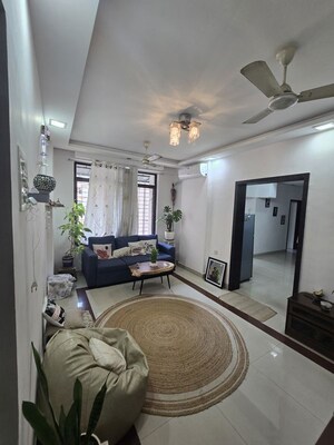 Living Room in 2 BHK Apartment at Versova Heights, Versova – for Rent