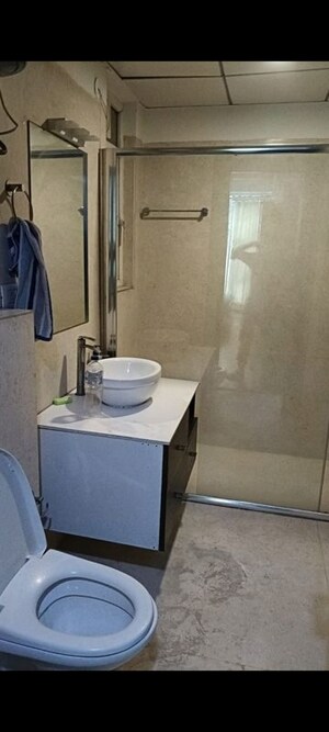 Bathroom in 4 BHK Apartment at Omaxe Forest Spa, Sector 93b – for Rent