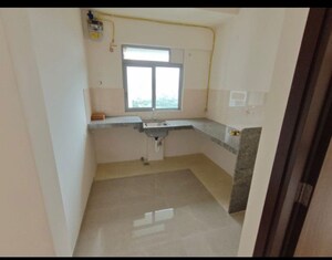 Kitchen in 1.5 BHK Apartment at Piramal Vaikunth, Balkum Pada – for Rent