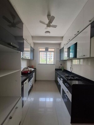 Kitchen in 3 BHK Apartment at Rustomjee Athena, Majiwada – for Rent
