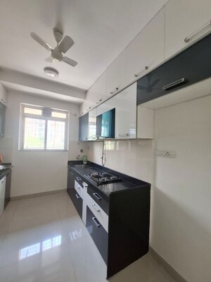Kitchen in 3 BHK Apartment at Rustomjee Athena, Majiwada – for Rent