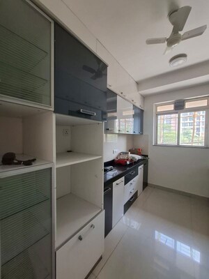 Kitchen in 3 BHK Apartment at Rustomjee Athena, Majiwada – for Rent
