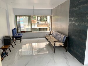 Living Room in 1 BHK Apartment at Kemps Corner – for Rent