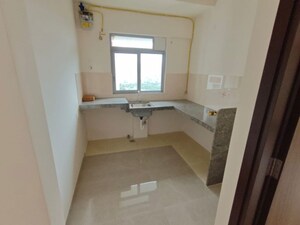 Kitchen in 1.5 BHK Apartment at Piramal Vaikunth, Balkum Pada – for Rent