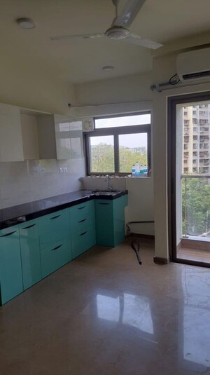 Kitchen in 1 BHK Apartment at Mahindra Vicino, Andheri East – for Rent