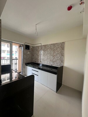 Kitchen in 2 BHK Apartment at Hubtown Greenwoods, Vartak Nagar – for Rent
