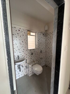 Bathroom in 2 BHK Apartment at Hubtown Greenwoods, Vartak Nagar – for Rent