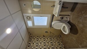 Bathroom in 2 BHK Apartment at Brigade Bricklane, Jakkuru – for Rent